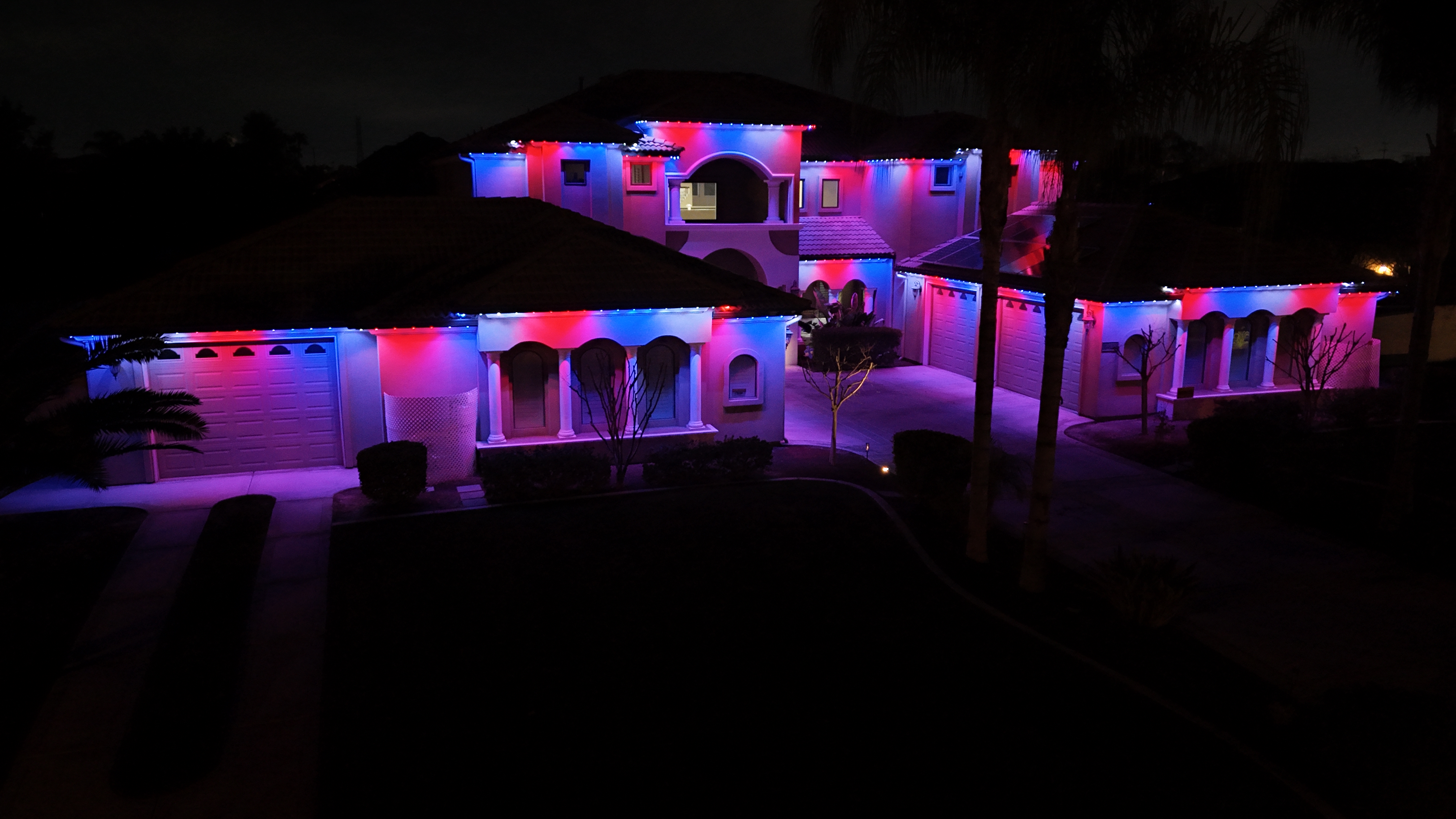 Bakersfield estate red and blue trim lighting ground level
